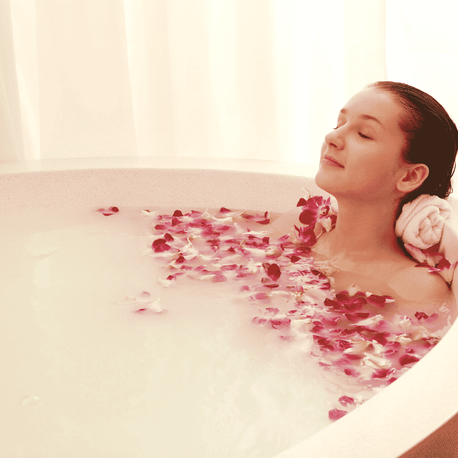 woman soaking in bath as new self-care ritual